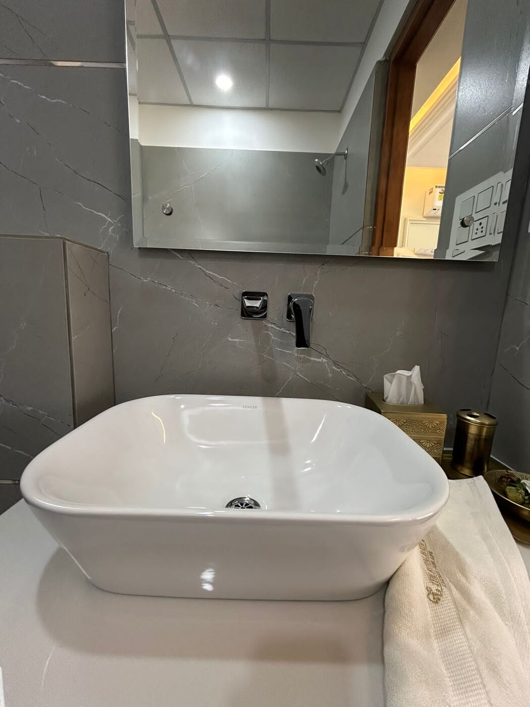 Counter-top basin with wall-mounted mixer and mirror — Absolute Residency, Sector 92 Mohali