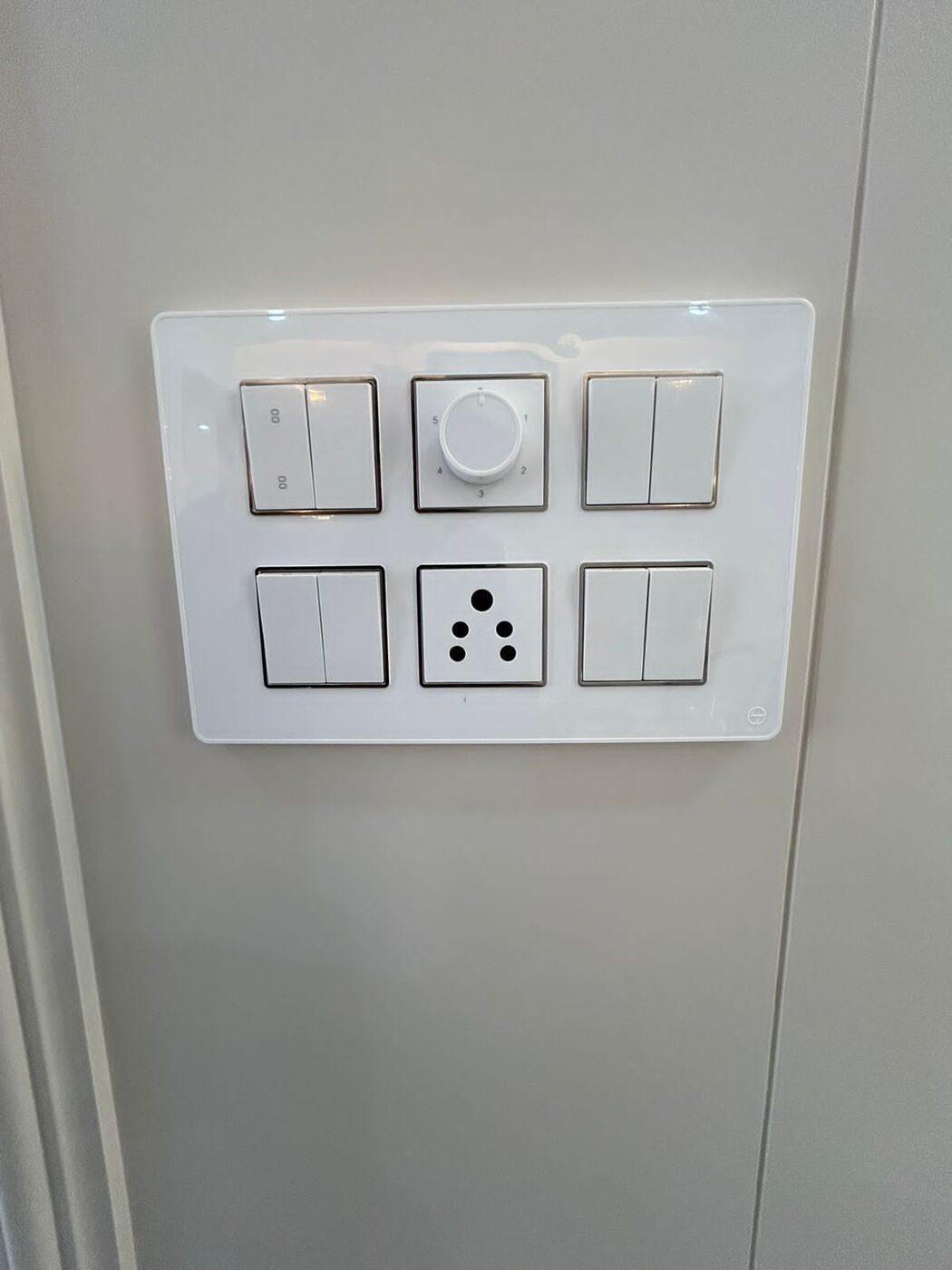 Wall switch plate with fan regulator and socket — Absolute Residency, Sector 92 Mohali