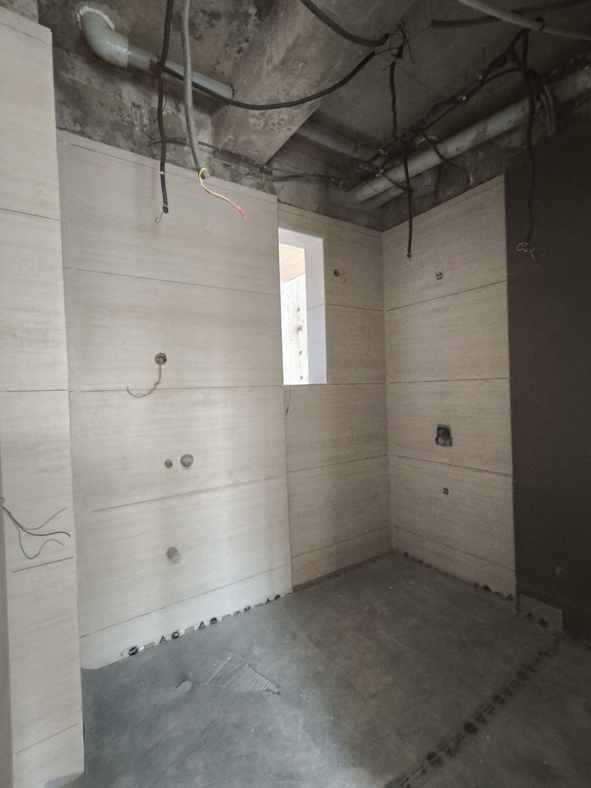 Sample flat washroom with wall tiles fixed, October 2026