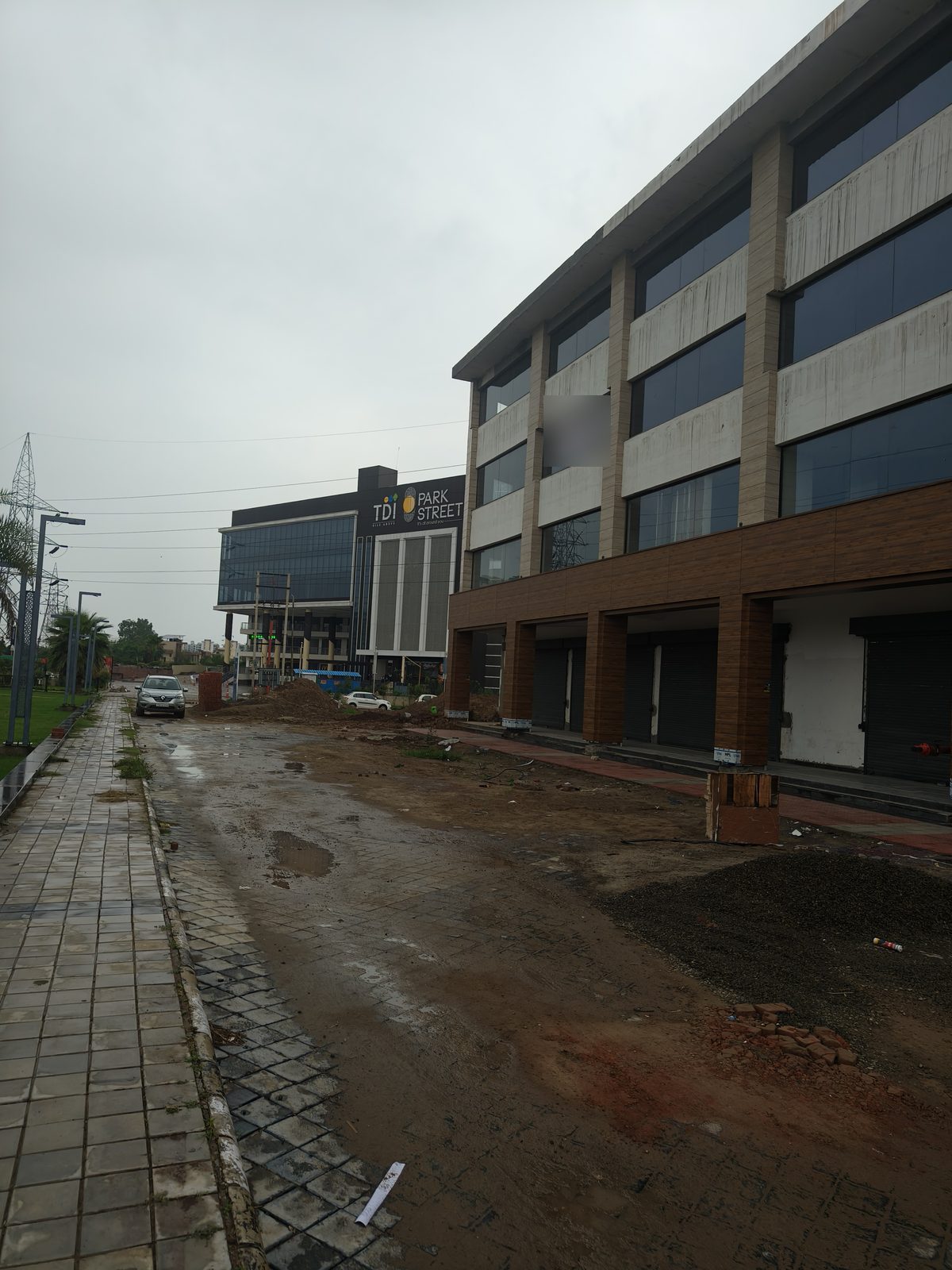 SCO row at TDI South Ex-I with Park Street behind, July 2025